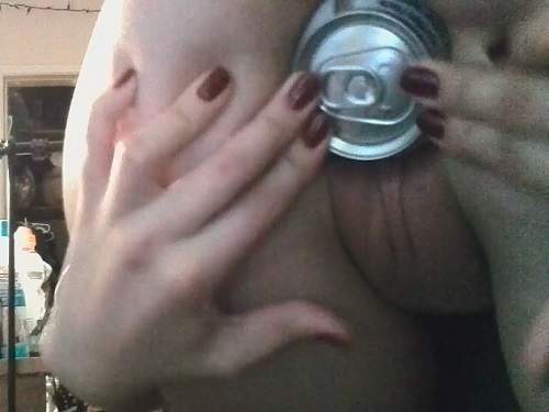 Hot chick solo beer tin penetrated into her cunt