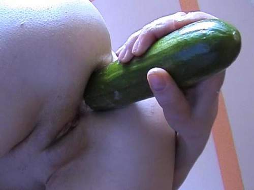 Booty girl solo penetration cucumber in ass