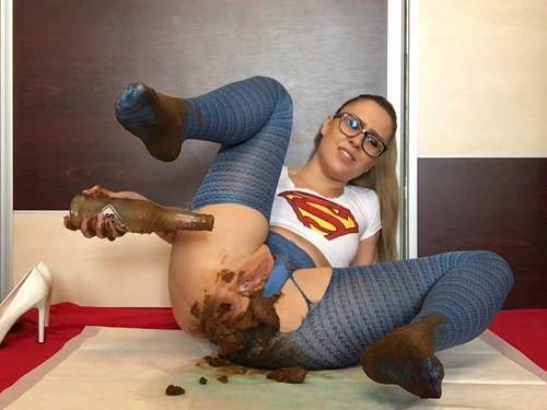 Supergirl Ella Gilbert penetration bottle in her scat ass