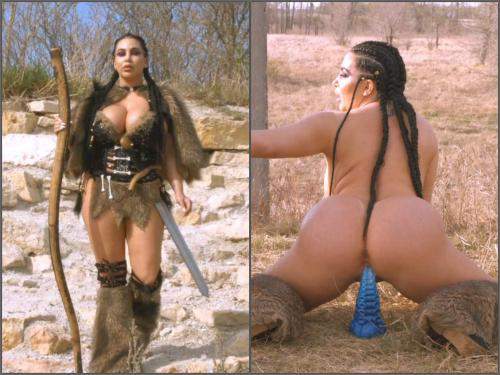 500px x 375px - Warrior amazon girl rides on a huge tentacle dildo outdoor ...